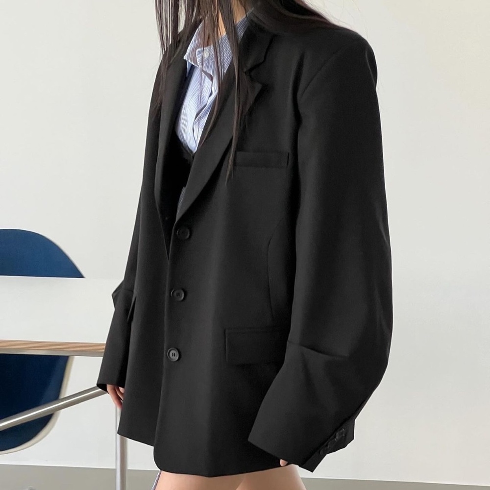 Black oversized blazer with wide sleeve. Woman blazer, suit jacket.